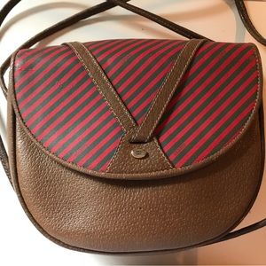 Authentic vintage Gucci Saddlebag circa 1983. Authentication paperwork in hand.